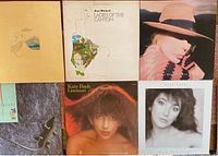 Six LP record sleeves laid out