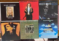 Front covers of six LP records