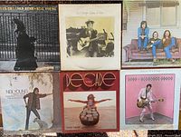 Six album fronts laid out for full view