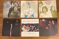 Front covers of all six LP albums laid out