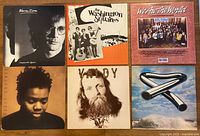 Six LP album covers laid out