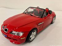 Front three-quarter view of red BMW Z3 model