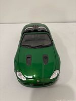 Front view of green Jaguar model car
