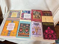 Nine of the books laid out showing front covers
