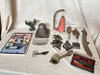 Group shot showing all items including book, razor hone box, straight razor case, and various hardware pieces