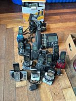 Group view of all handsets, chargers, corded base, adapters