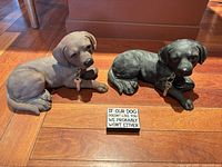 Overall lot with two dog figurines and sign