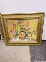 Full view of framed floral still-life painting