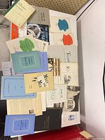 Top-down view showing full assortment of pamphlets spread on tabletop