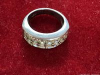 Full view of sterling silver ring showing stones in band