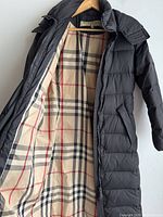 Inside view showing Burberry check lining and label