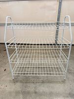 Front view of 4-tier wire shelf unit