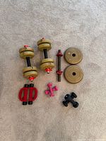 Group shot of all weight equipment on carpet