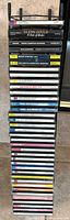 Full view of stacked classical CDs in metal tower