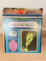 Stack of LPs fronted by Edith Piaf at the Olympia cover