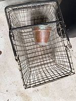 Wire basket with small copper planter pot