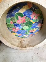 Interior showing mosaic lily pads and flowers