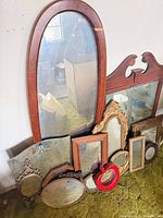 Group shot of all mirrors leaning against wall