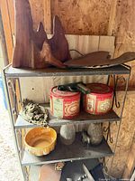 Full view of metal shelf and contents