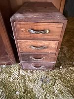 4-drawer wooden cabinet front view