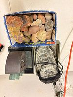 Box of assorted stones, carved stone fixture, bound slate pieces