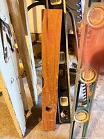 Step stool, levels, part of hedge trimmer visible