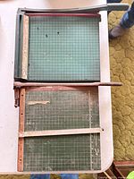 Both paper cutters side by side showing overall condition