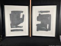 Front view of both framed abstract artworks