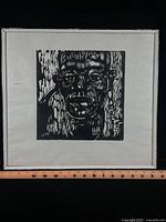 Full view of framed woodcut print