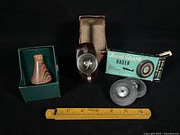 Group view of kaleidoscope, compass, wheels and measuring ruler for scale