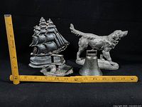 All four metal items with ruler for scale