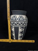 Side view with ruler indicating height roughly 8.25 inches