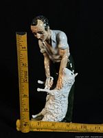 Front view with ruler showing height around 6.5 in.