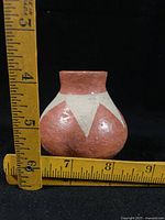 Pot next to ruler showing approximately 2.5 in height