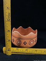 Pot beside ruler showing height and diameter