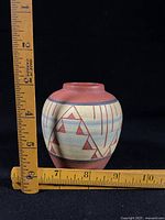 Front view with ruler showing size and pattern