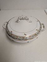 Lidded porcelain bowl showing exterior decoration