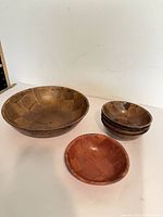 Group view of one large bowl, stack of four small bowls, and one additional small bowl