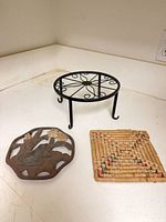 All three trivets side by side on countertop