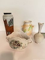 Front view of all four vases