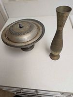 Brass vase and pewter serving bowl overview