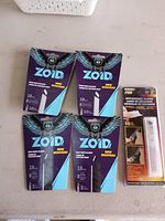 Front view showing four Zoid packs and one generic pack