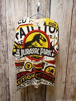 Full front view of T-shirt on hanger