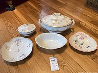 Group shot of all five porcelain serving pieces