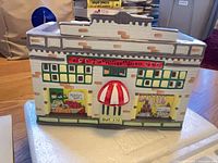 Front view of Village Market ceramic building