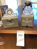 Clock and inkwell on their Waterford boxes with lot tag visible