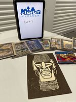 Group view of eight cards, block print and woven pouch