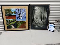 Both framed artworks side by side