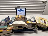 Group shot of entire book lot on table