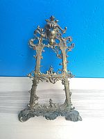Full view of cast brass ornate tabletop easel